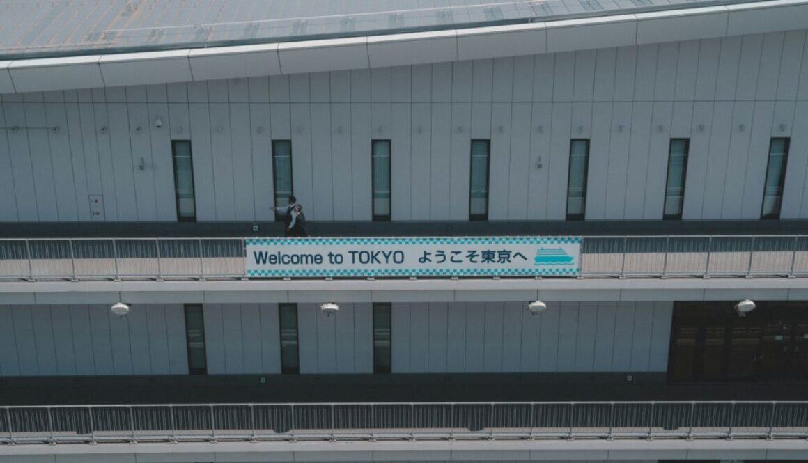 thumbnail-8 a building with a sign that says welcome to tokyo